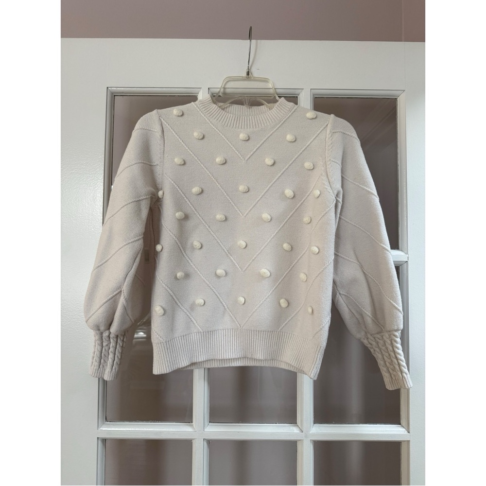 Elegant Cream Sweater with Textured Design
